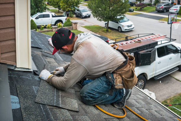 Professional Roof Repair technician working in Lenore, ID